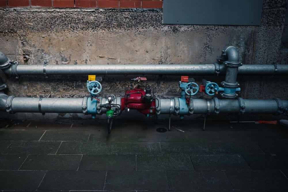 How Testing Assemblies During Commercial Backflow Services Prevents Cross-Contamination Fines
